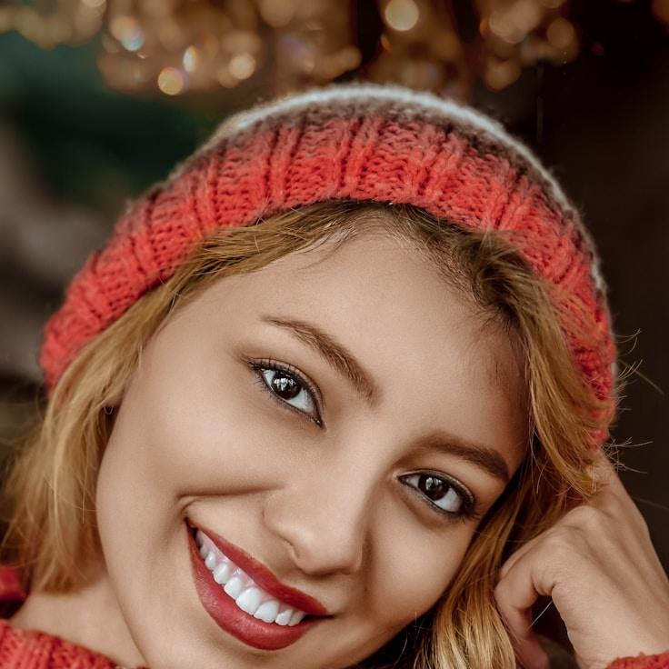 Kaveri Mehta, Lead Design Curator at SoundCornerPaper, reviewing corporate floral arrangements